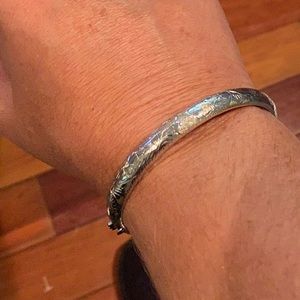 Silver intricate bangle